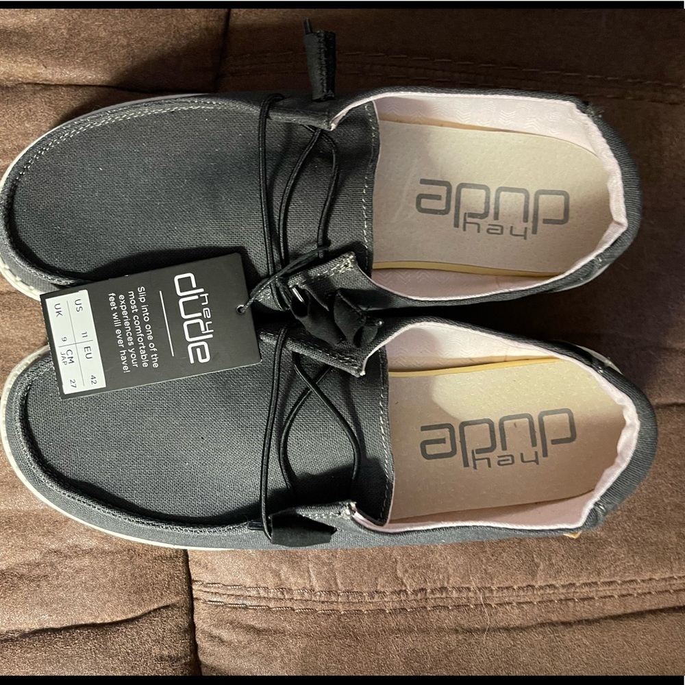 Womens brand new Hey Dudes never worn, new with tags. Size 11 womens